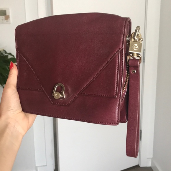 Tory Burch Handbags - Tory Burch Burgundy clutch wristlet -gold hardware